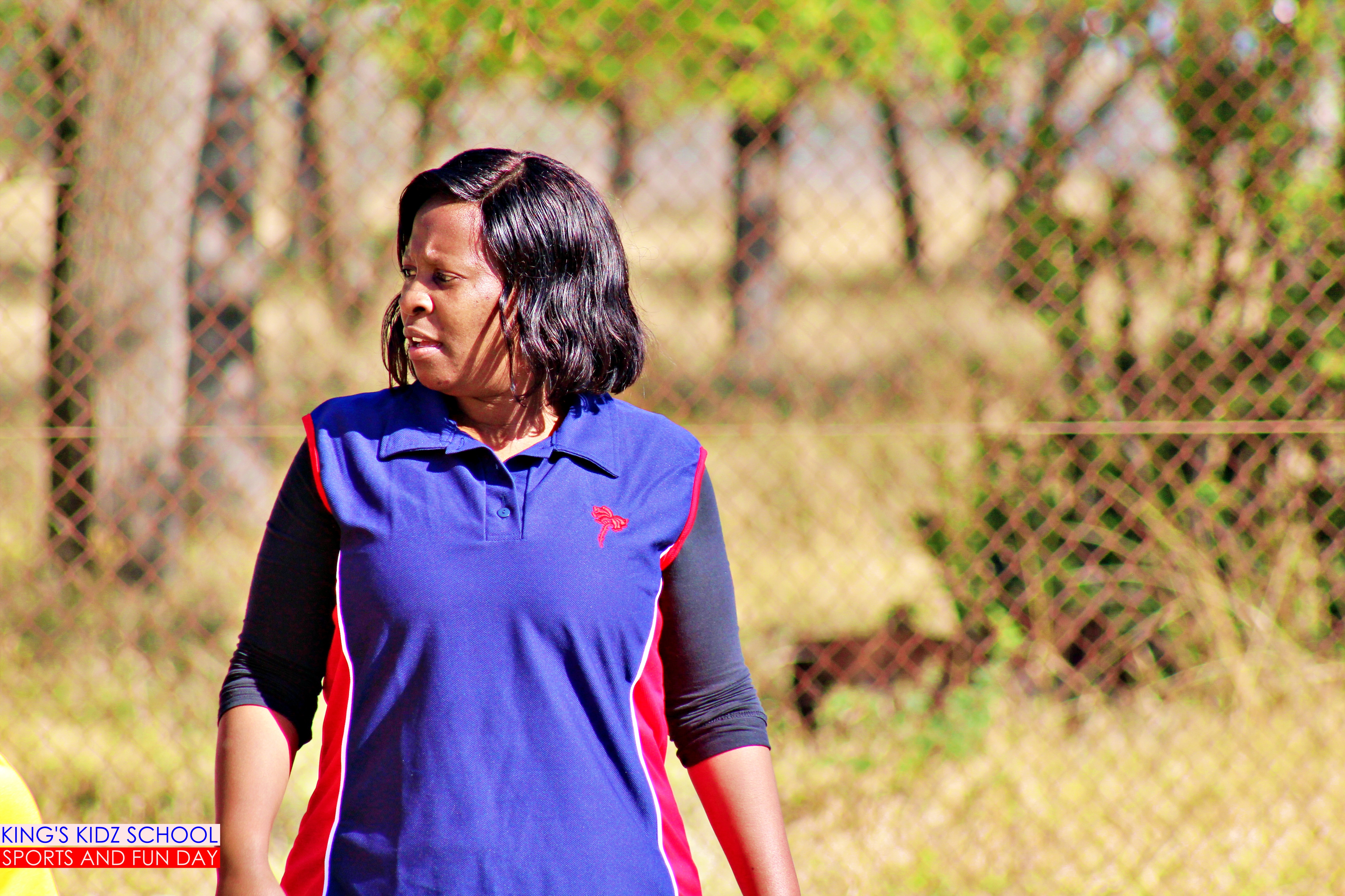 Teacher helping student